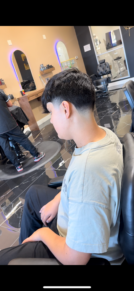 Fresh haircut with tapered side profile