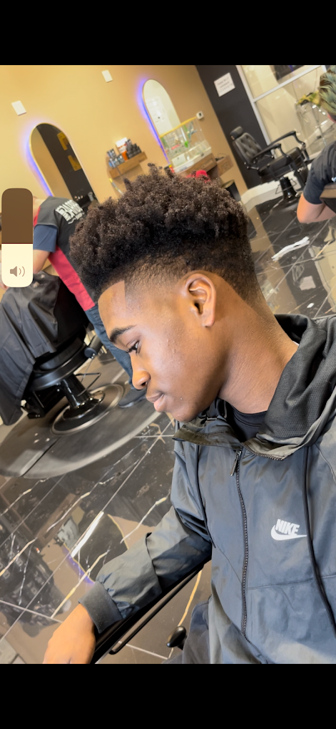 High fade with natural curls